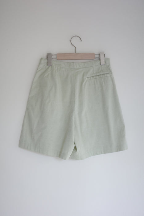 Pale green shorts